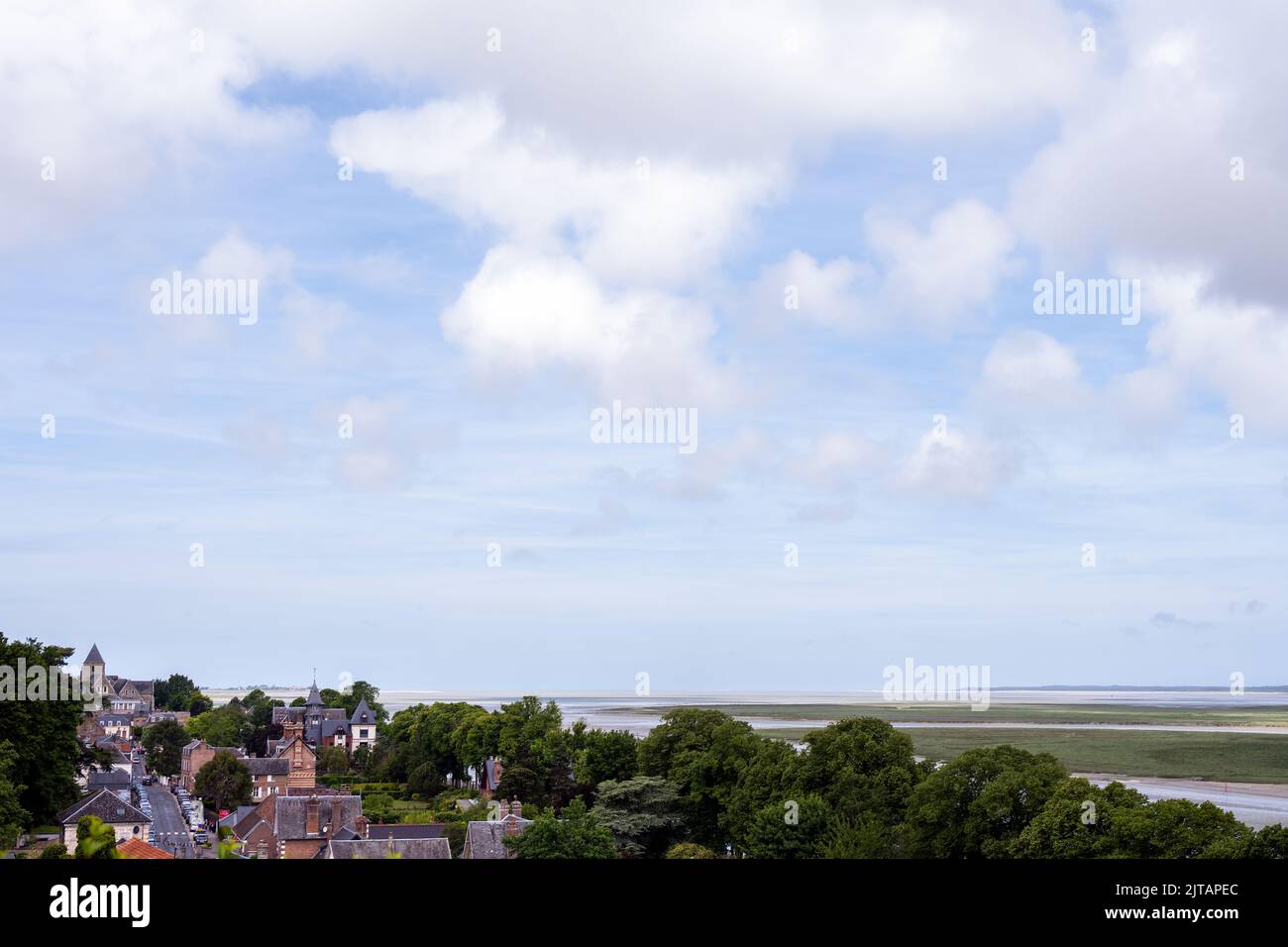 SAINT-VALERY-SUR-SOMME, fRANCE - MAY 26th, 2022: View of Saint-Valéry-sur-Somme and the Somme Bay on a cloudy spring day, Normandy, France Stock Photo