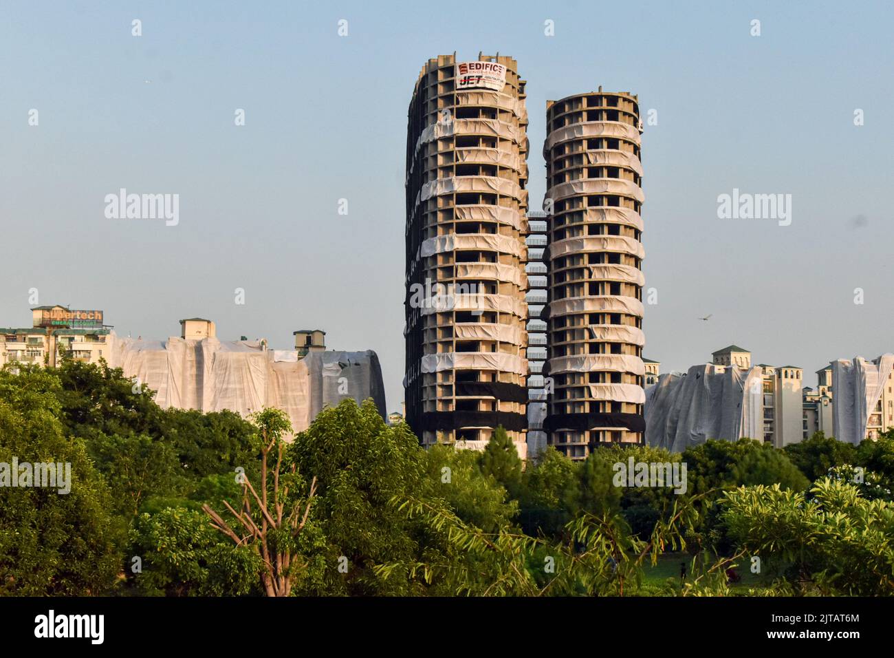 Supertech twin towers ahead of their demolition with explosives in compliance with a Supreme Court order, in Noida, Saturday, Aug. 27, 2022.Over 3,700 kg explosives will be used to raze down the nearly 100-metre-tall structures on 28 August 2022. (Photo by Mohsin Javed/Pacific Press) Stock Photo