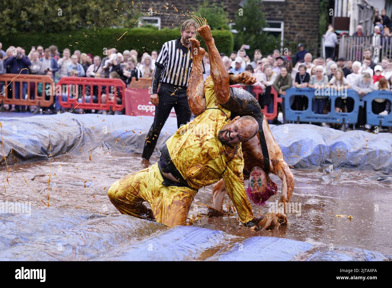 Competitors take part in the World Gravy Wrestling Championships at the