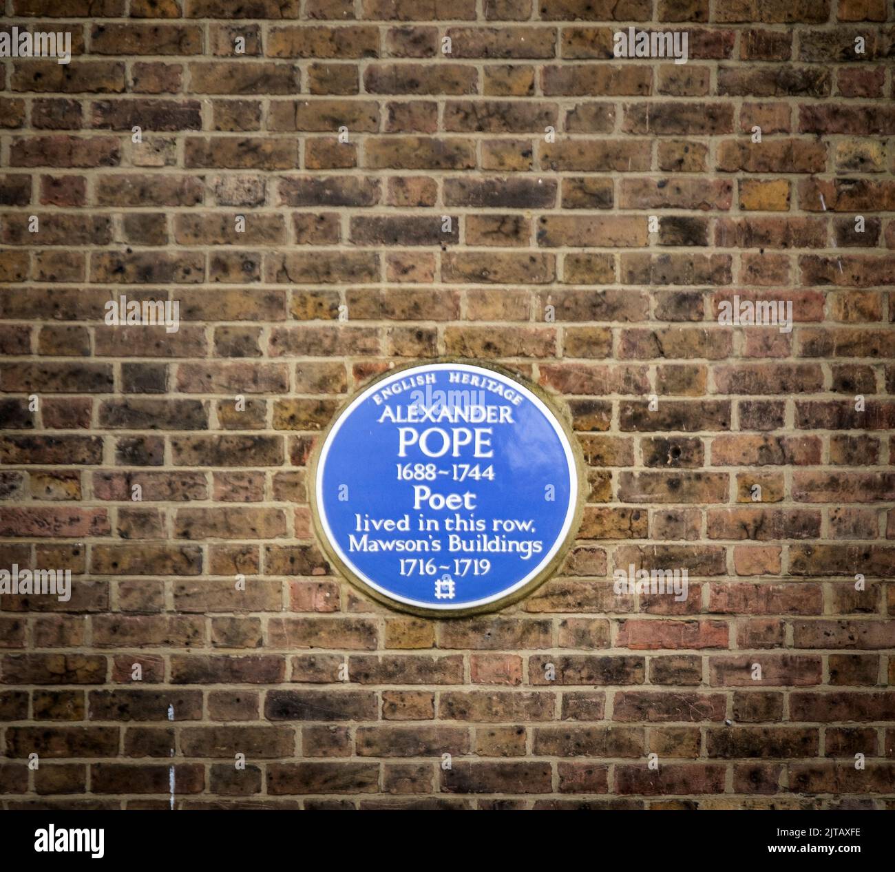 Alexander Pope plaque on the wall of Mawsons buildings, Chiswick, London Stock Photo