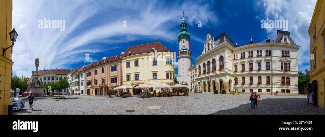 Panorama of Fo ter (Main Square) with Holy Trinity Statue (1701), Museum Quarter, Firewatch Tower and Town Hall, Sopron, Hungary Stock Photo