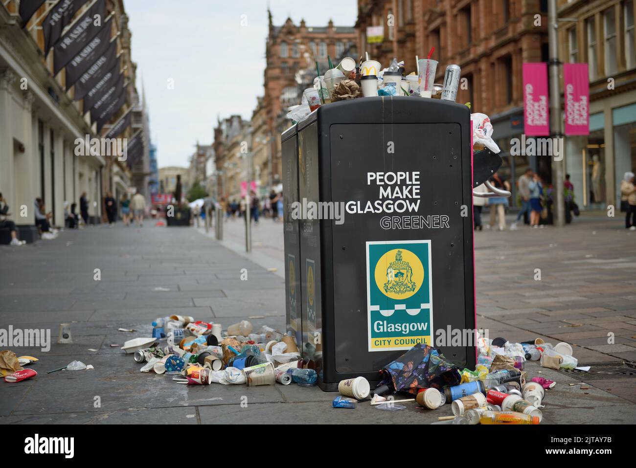 Overflowing litter bin on Glasgow's Buchanan Street Stock Photo Alamy