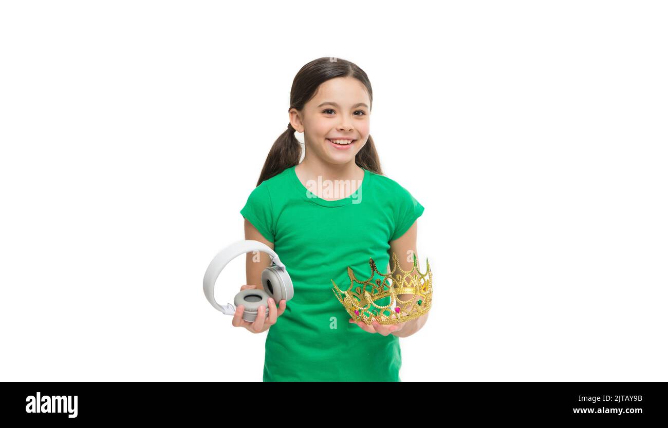 pop princess. queen of music. portrait of cheerful girl isolated on white. happy childhood. small girl choose between crown and headphones. being a Stock Photo