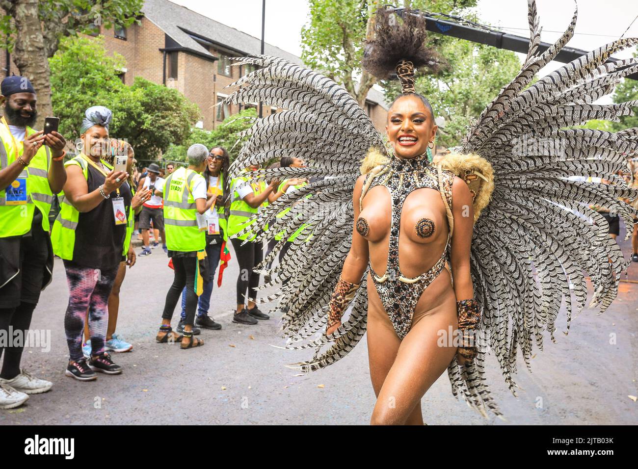 London, UK. 29th Aug, 2022. Participants and revellers have fun along the main parade at Notting Hill Carnival 2022. The carnival, a celebration of Caribbean culture, returns to London after 2 years of restrictions and is expected to easily exceed 1 million visitors again this year. Credit: Imageplotter/Alamy Live News Stock Photo