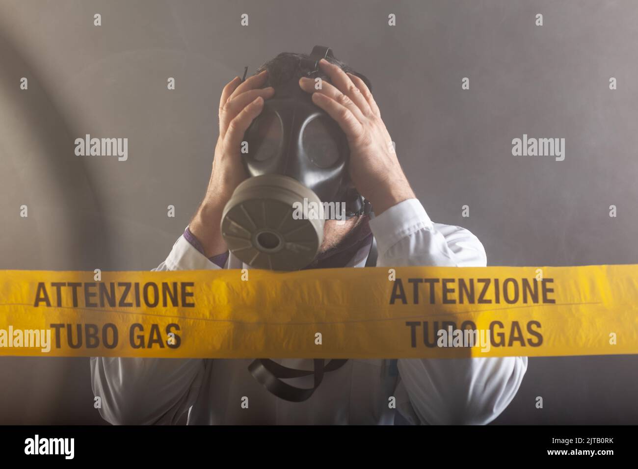 A medical engineer wearing antigas mask experienced in the gas leaks crisis directing the