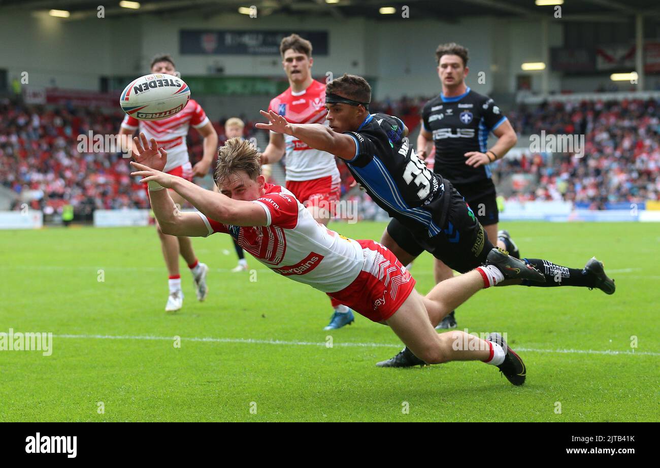 St Helens' Keane Gilford (left) and Wakefield Trinity's Corey Hall in