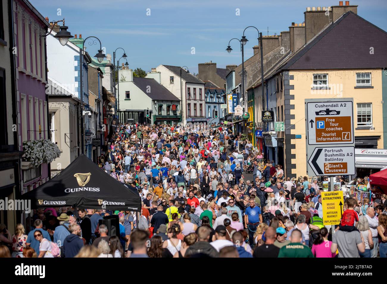 Crowds walking through the centre of Ballycastle during the Ould Lammas