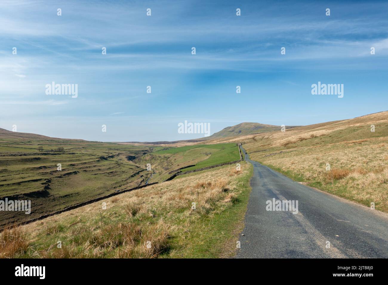 Views of Pen-y-ghent mountain from the country lane near Halton Gill, Yorkshire Dales National Park Stock Photo