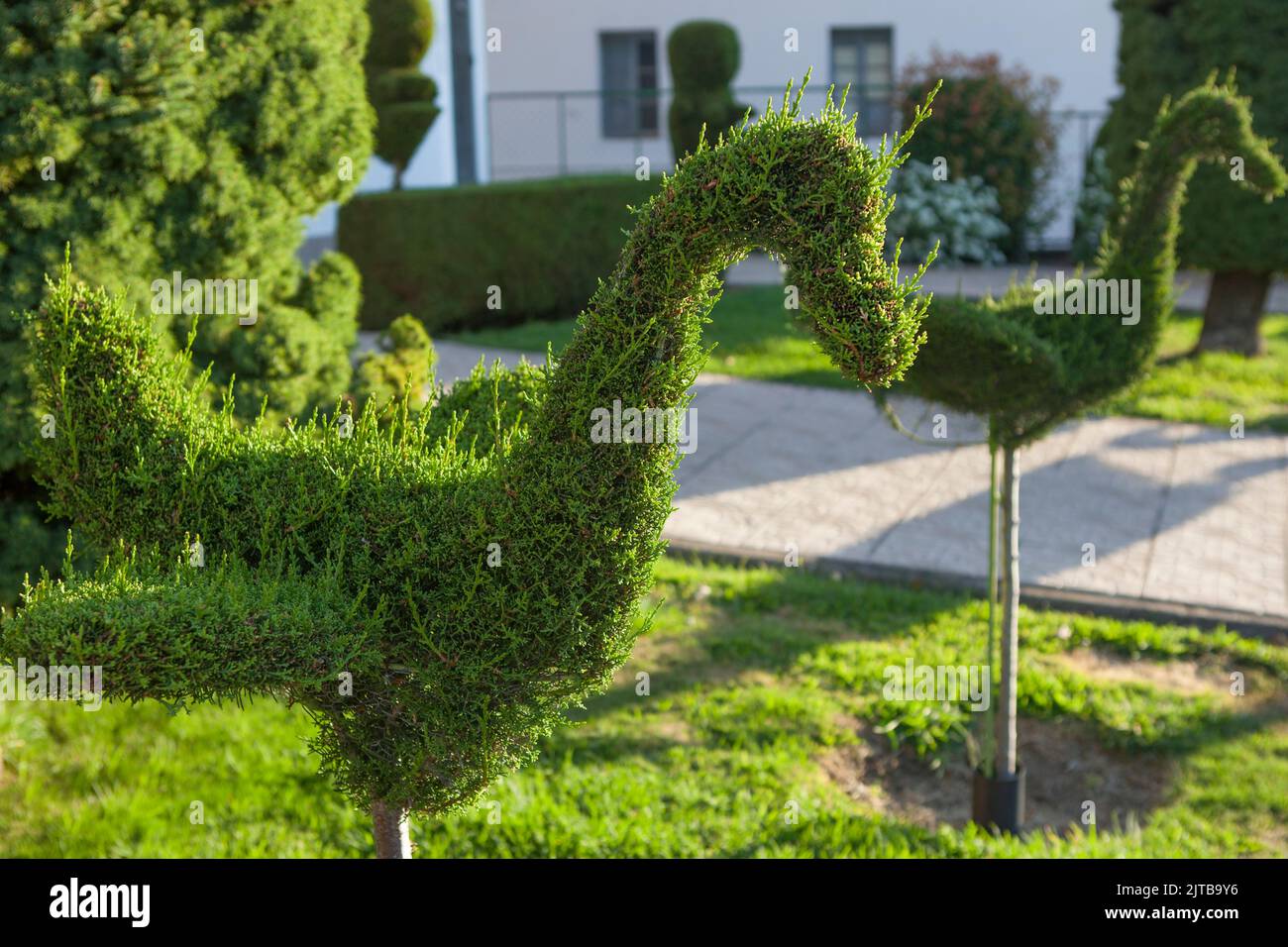 Green birds sculptures, the most distinctive image of the town. Losar de la Vera, Caceres, Extremadura, Spain Stock Photo