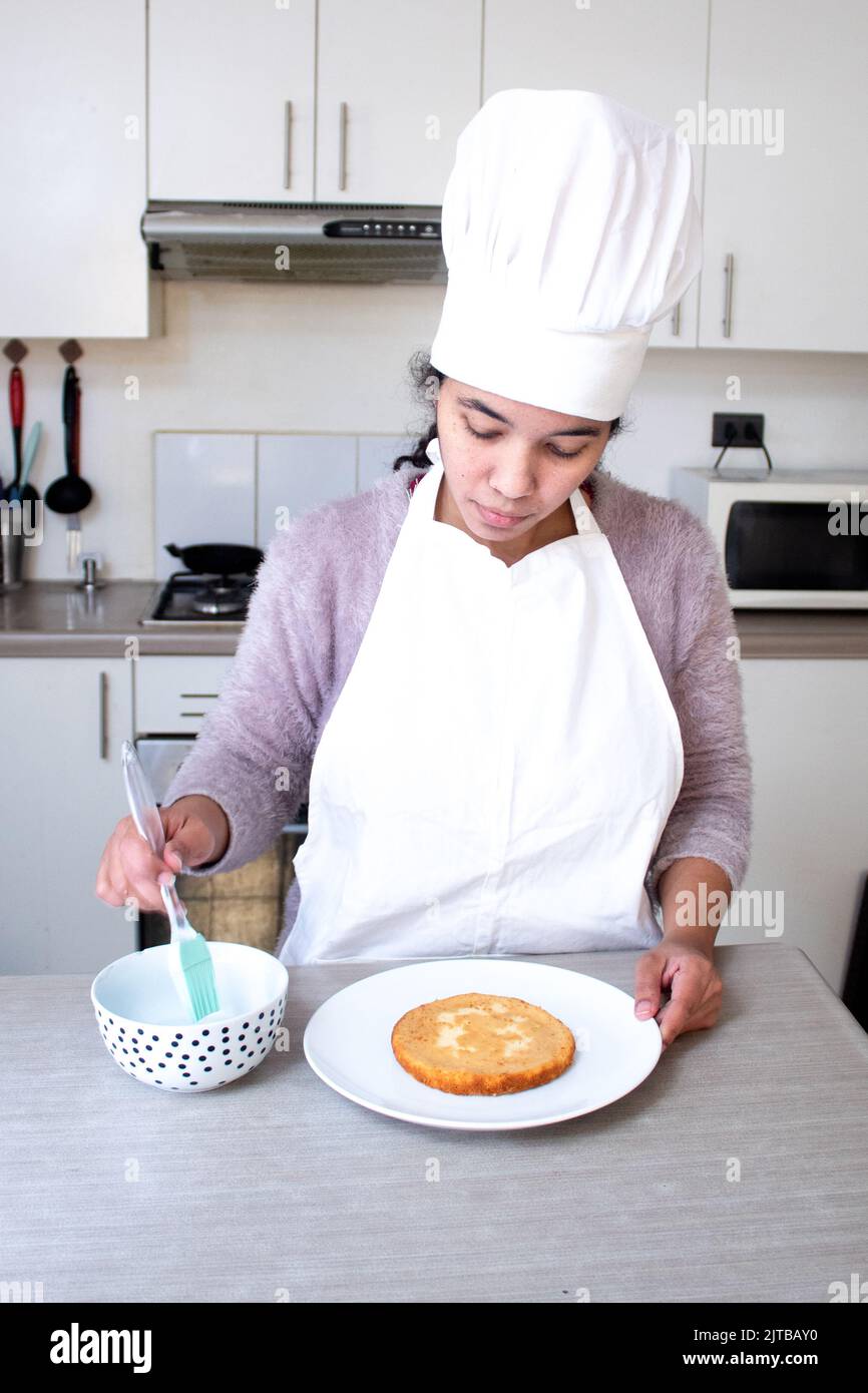 Chef making a cake Stock Photo Alamy
