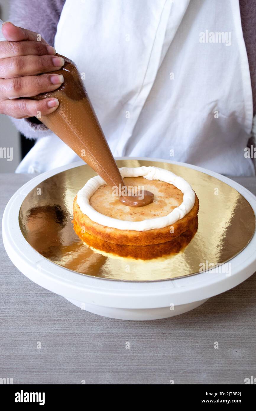 Chef making a cake Stock Photo Alamy