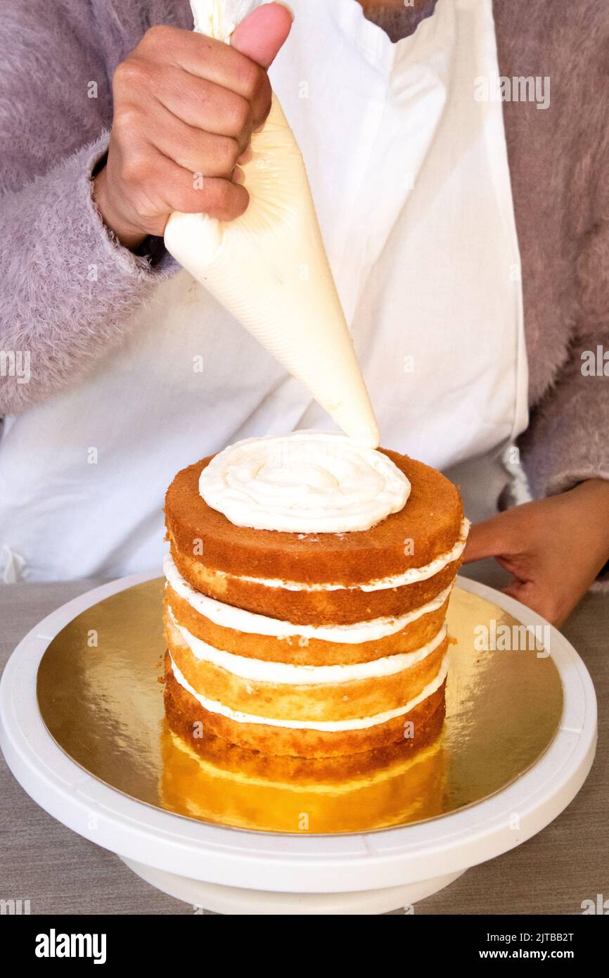 Chef making a cake Stock Photo Alamy