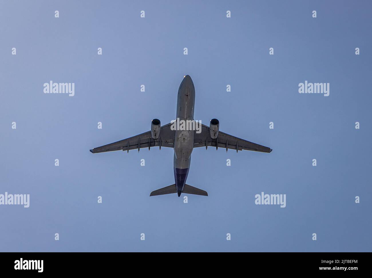 A Hawaiian Airlines flight taking off from Boston on a long flight to