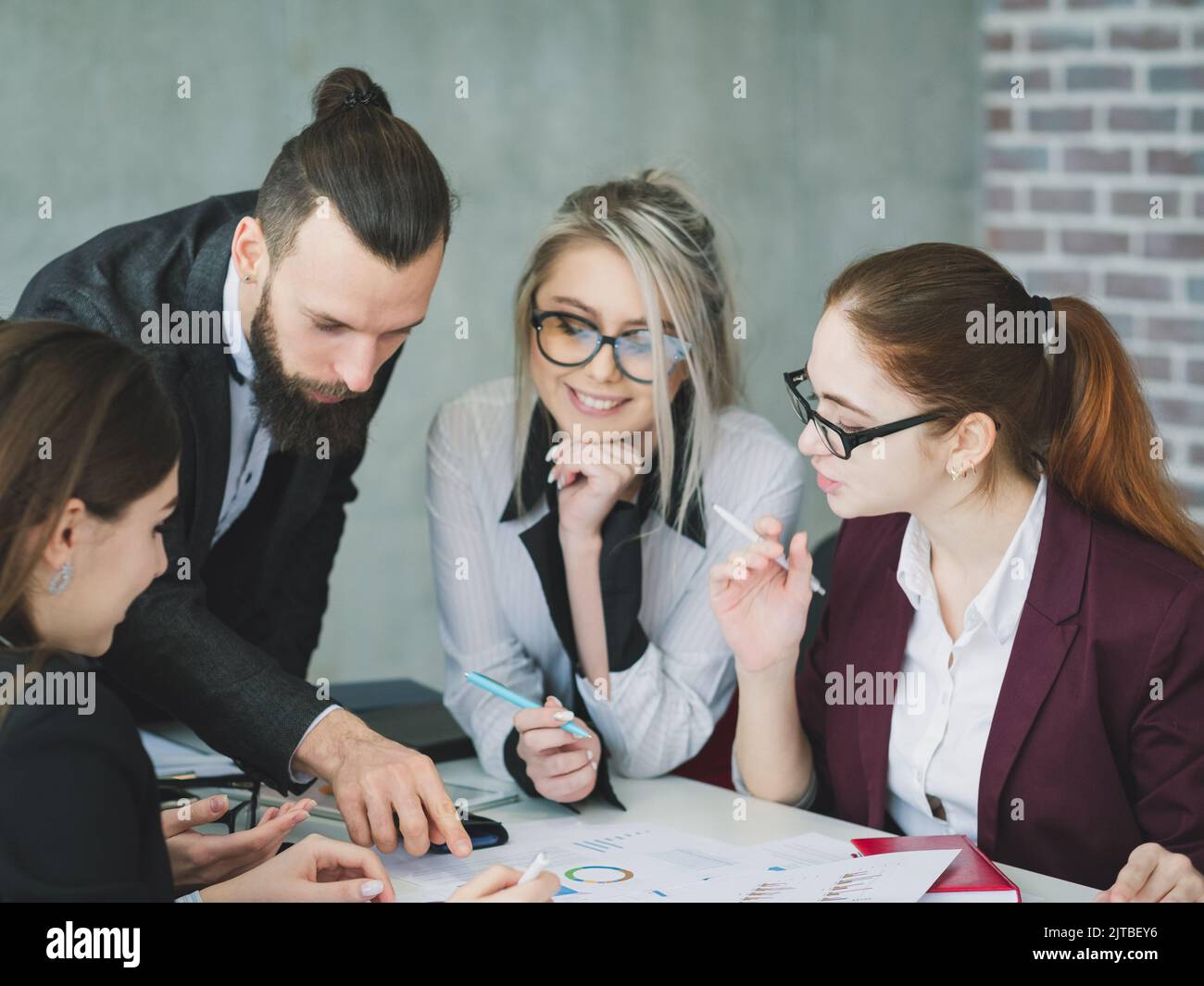 business teamwork colleagues discussion strategy Stock Photo - Alamy