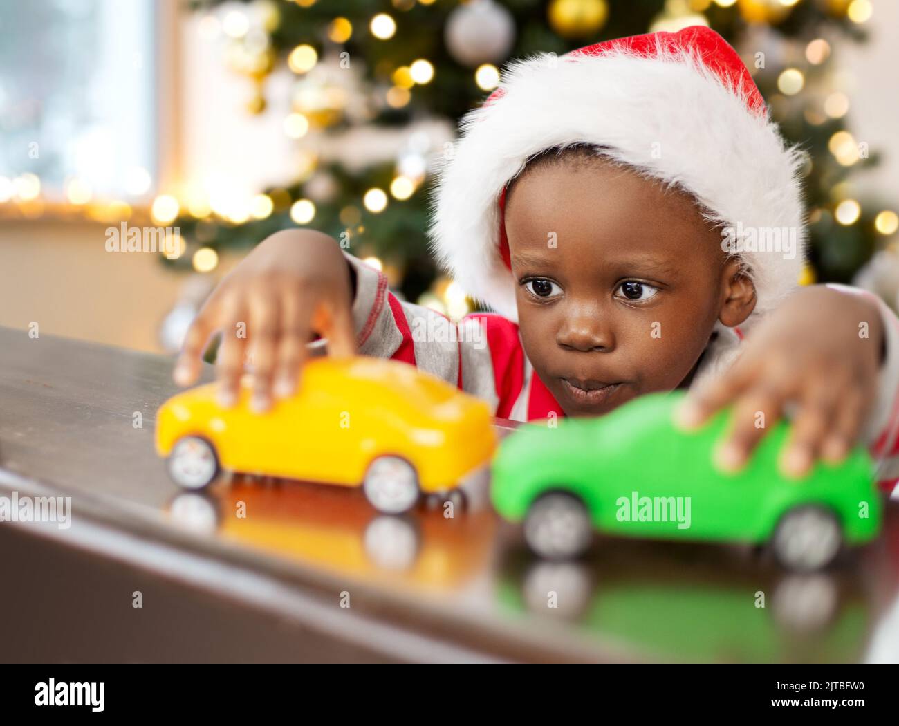Boy playing toy cars hires stock photography and images Alamy