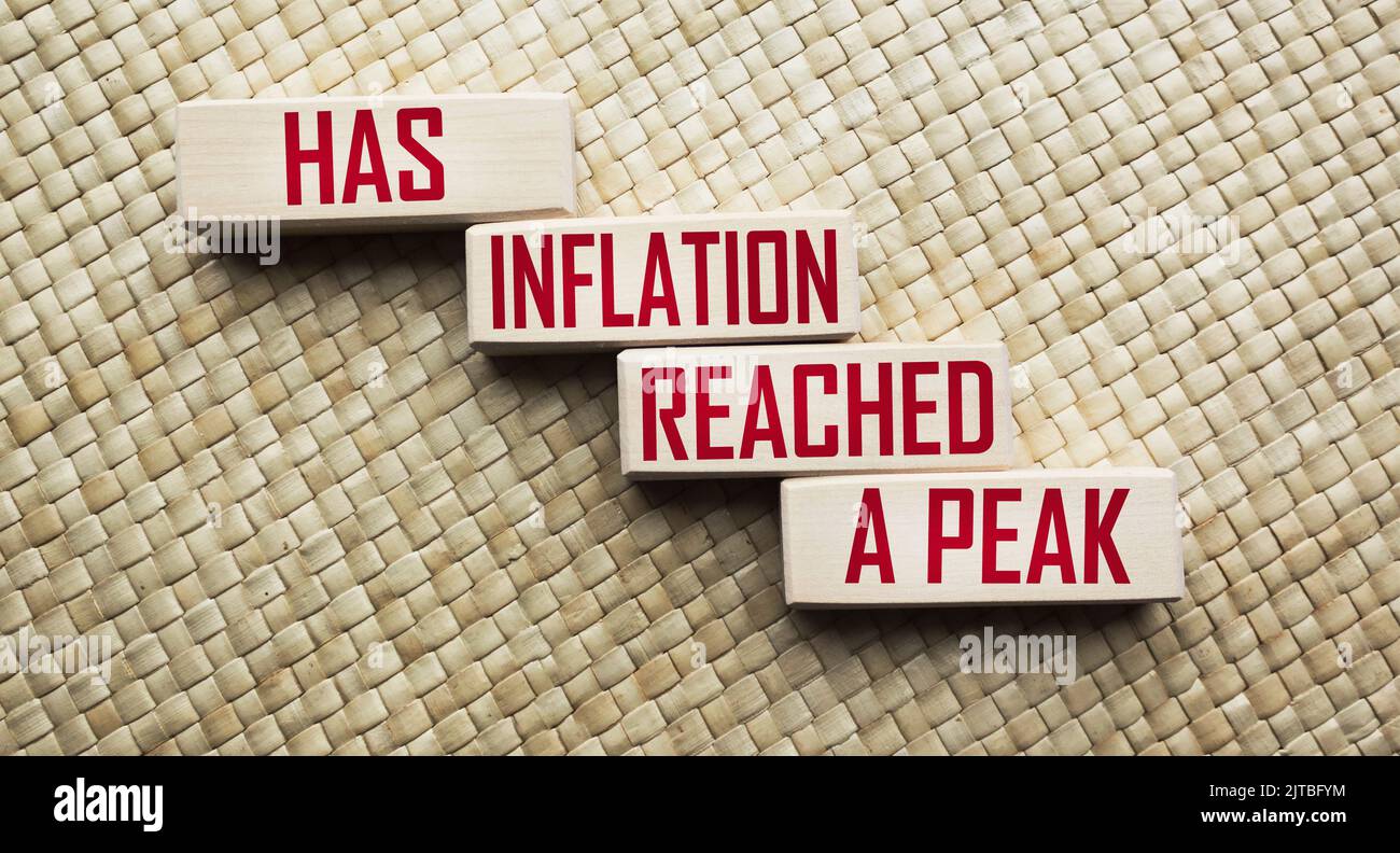 Business concept. On wooden blocks there is an inscription - Has inflation reached a peak Stock Photo