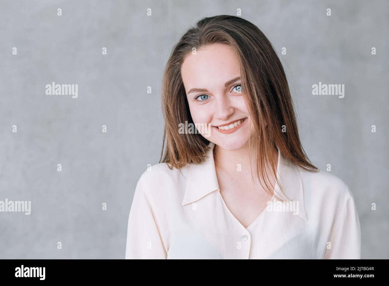 smiling young woman youth beauty copy space Stock Photo