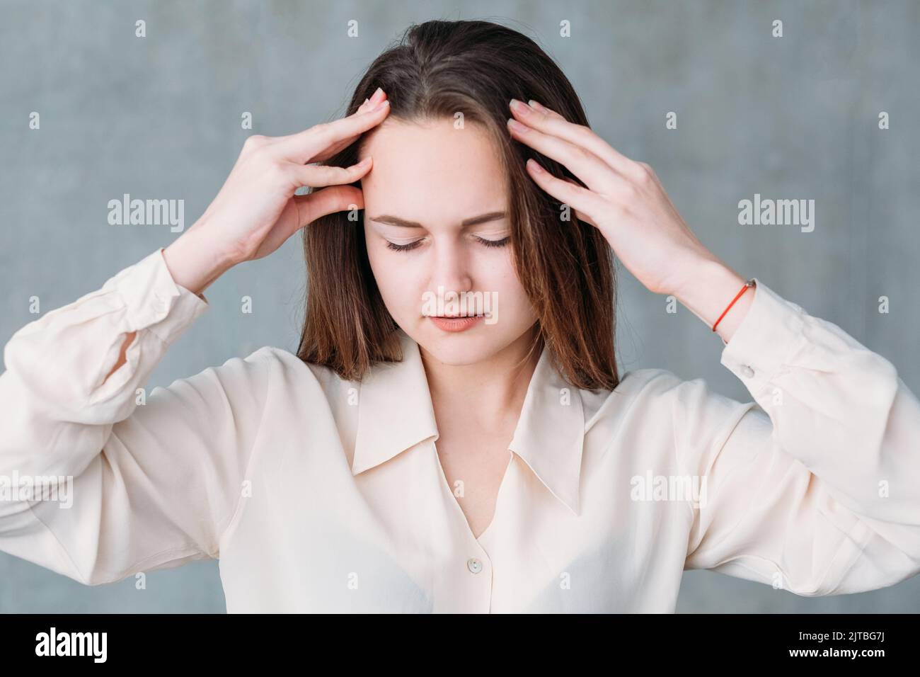 concerned professional concentration young woman Stock Photo