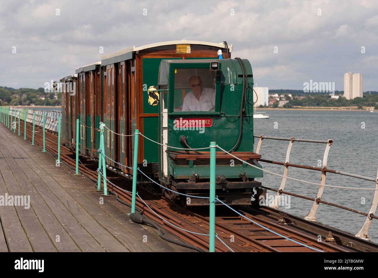 Southampton Water, southern England, UK. 2022. Tractor unit Gerald Yorke and passenger coaches on Hythe Pier on Southampton Water. The train transport Stock Photo