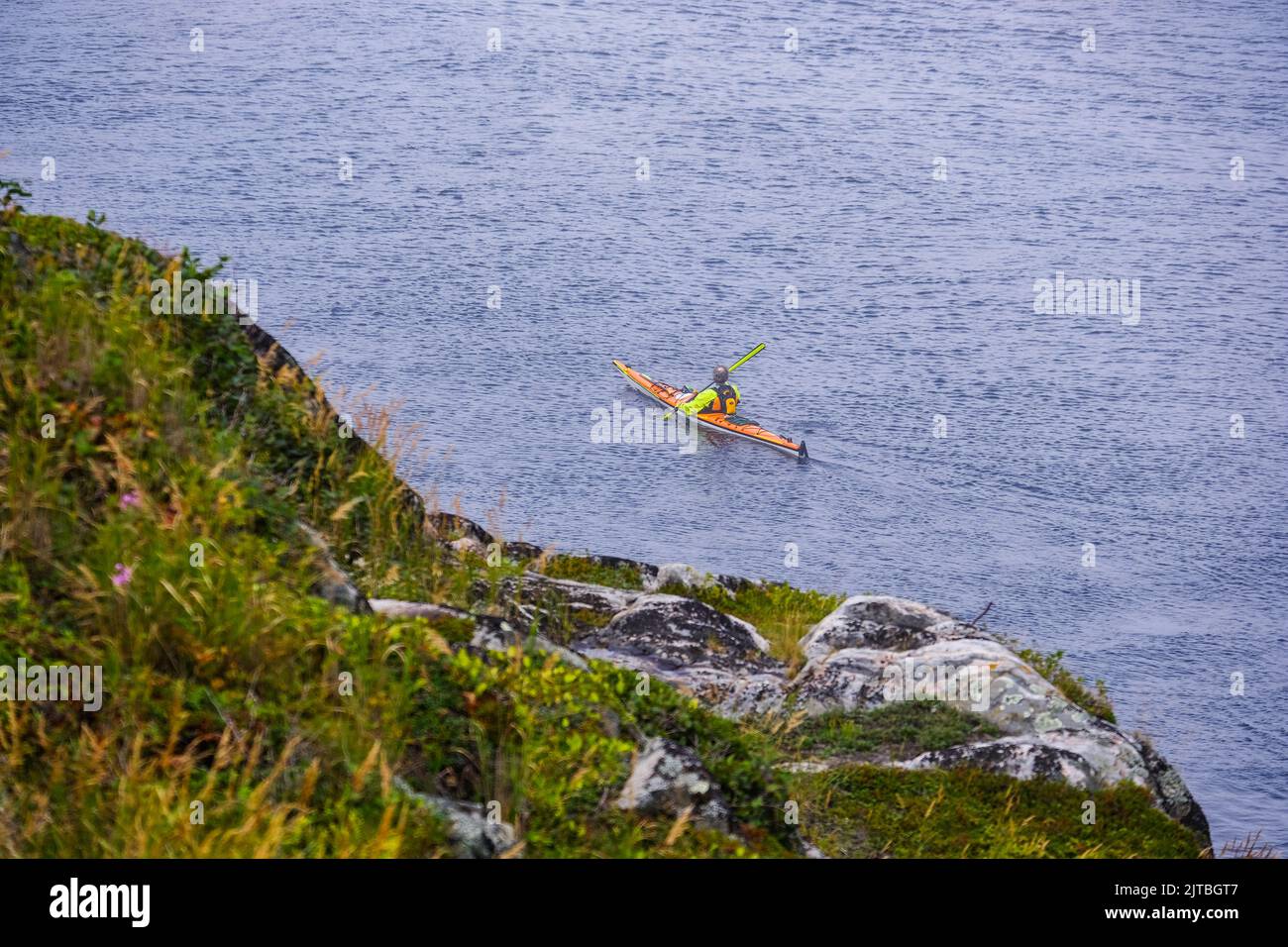 Sea kayaker off Pointe Noire, Baie St-Catherine, Quebec, Canada. Stock Photo