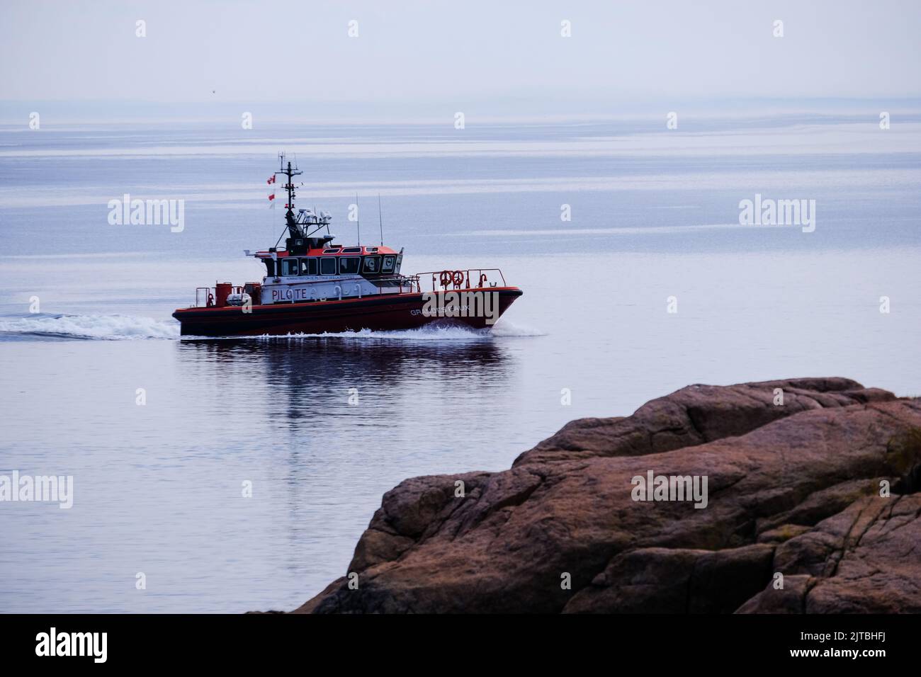 Cargo ship pilot boat on the St. Lawrence river, near Les Escoumins, Quebec, Canada. Stock Photo