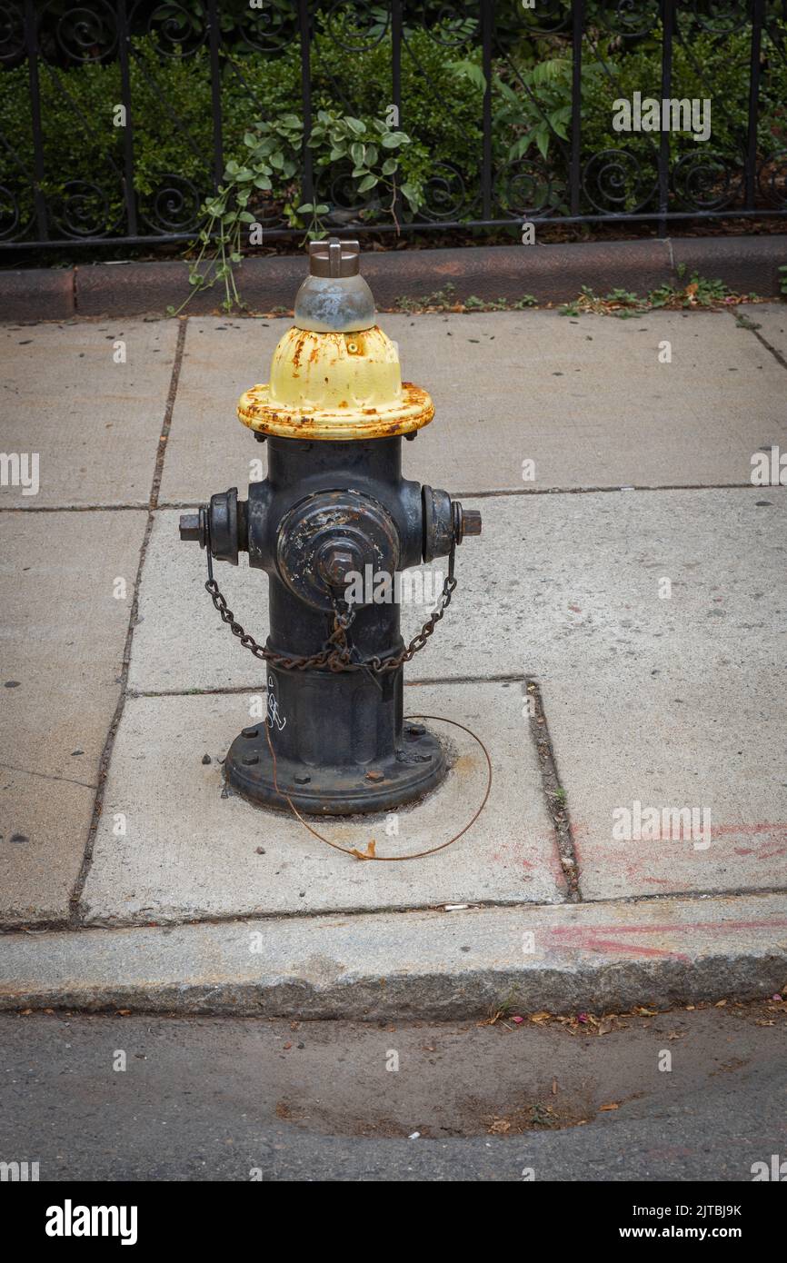 A fire hydrant on the street in Boston Stock Photo