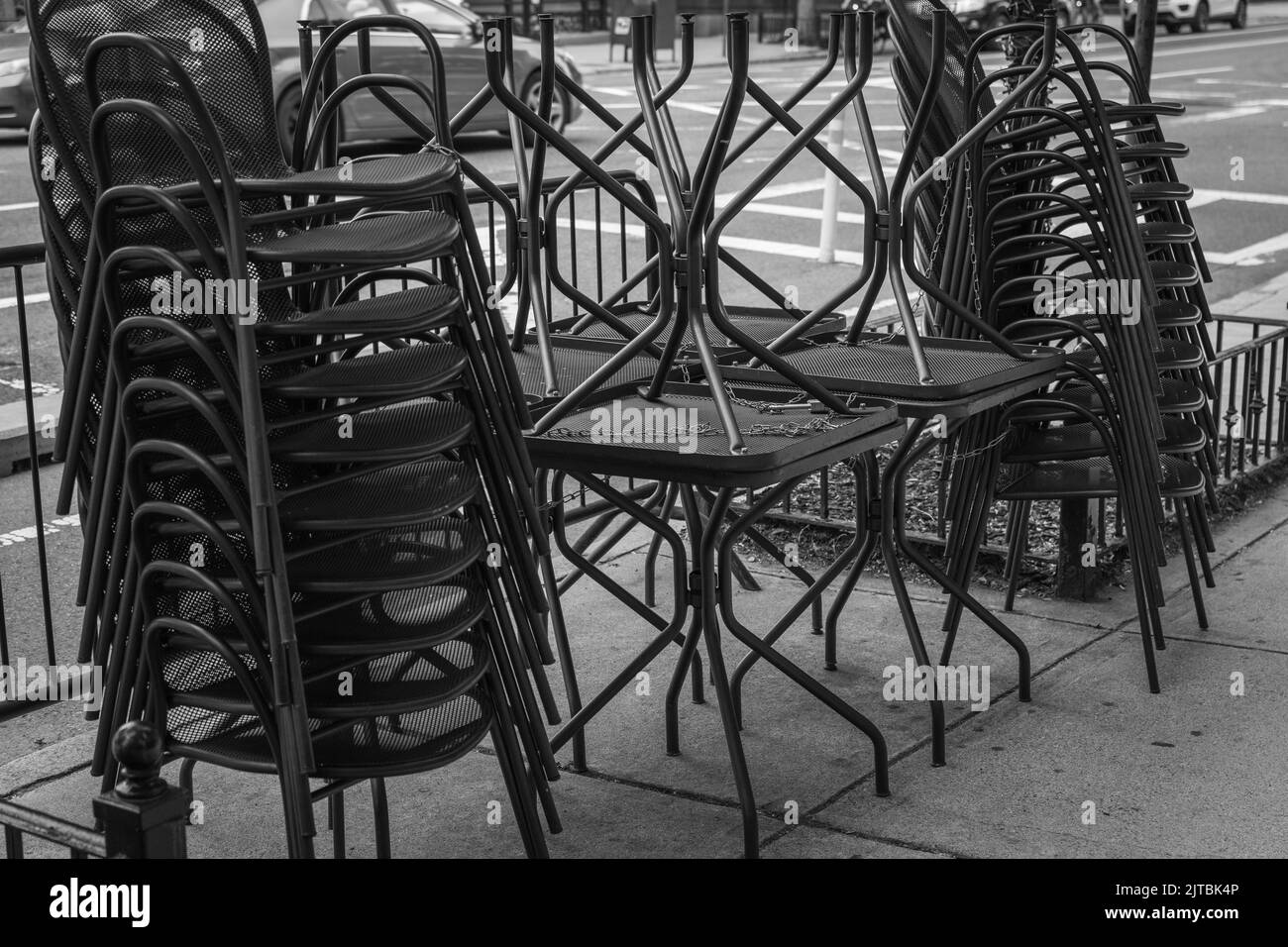 A few stacked chairs outside a business in Boston Stock Photo