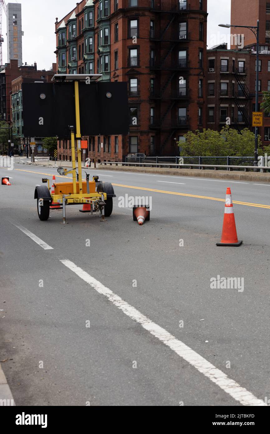 A road work sign with traffic cones Stock Photo - Alamy