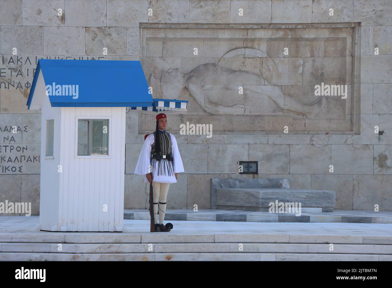Athens, Greek - August 28: 2022: Change of Guard at the in front of the parliament, Monument of the Unknown Soldier at Syntagma Square the central squ Stock Photo
