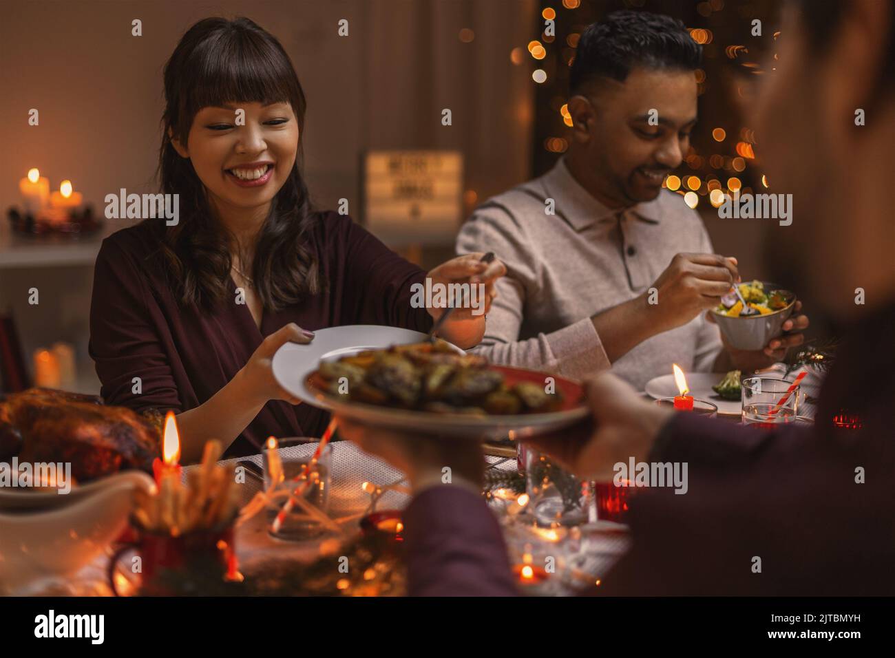 Indian family having dinner hi-res stock photography and images - Alamy