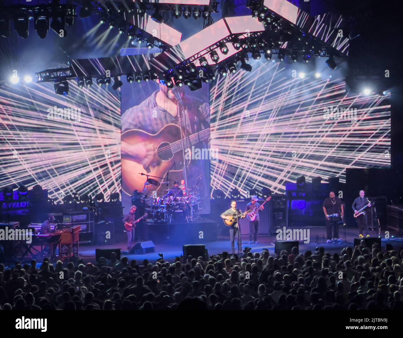 A scenic view of Dave Matthews band performing a live show on a stage
