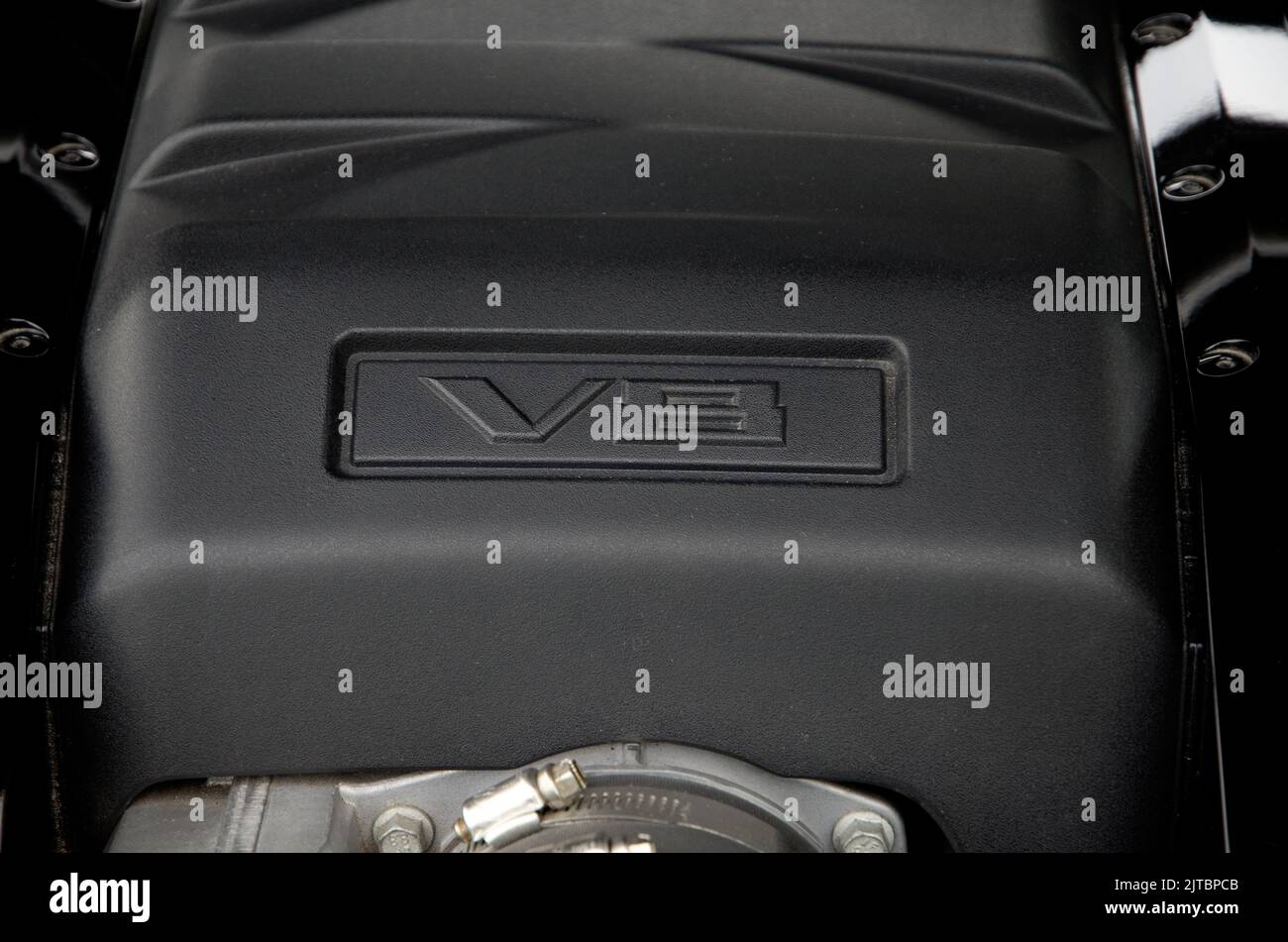 Modern Automobile V8 Black Plastic Engine Cover Horizontal Stock Photo