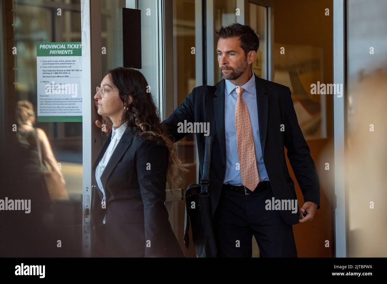 Lawyer Chris Murphy leaves following a court appearance by Dawn Walker