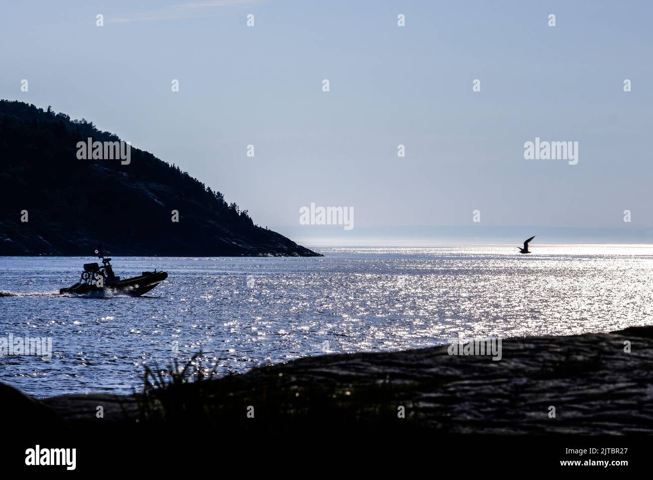 Boats near the harbor at Tadoussac, Quebec, Canada, Saguenay Fjord National Park, Saguenay River, St. Lawerence river. Stock Photo