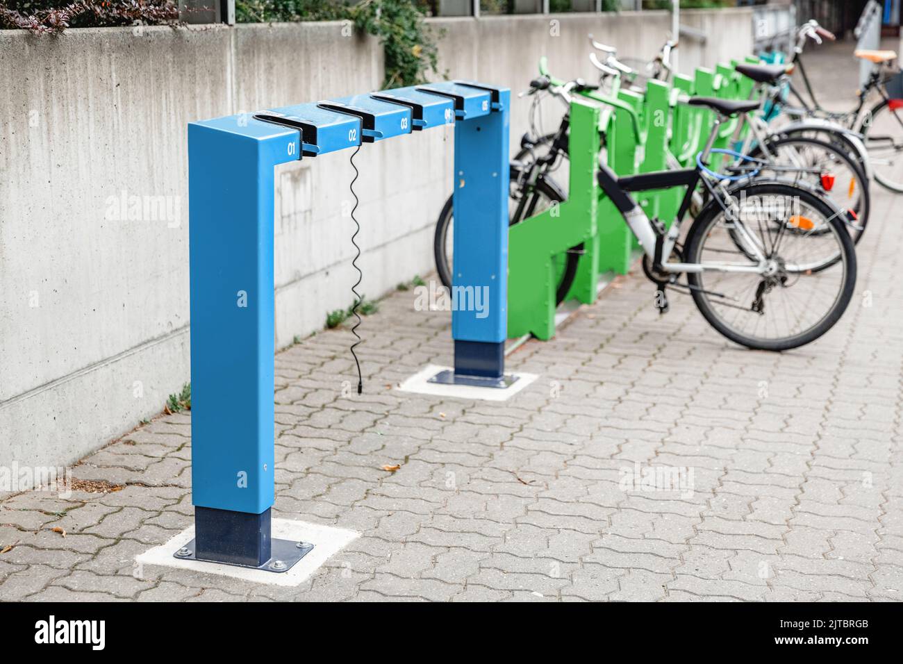 electric scooter parking and charging station Stock Photo Alamy