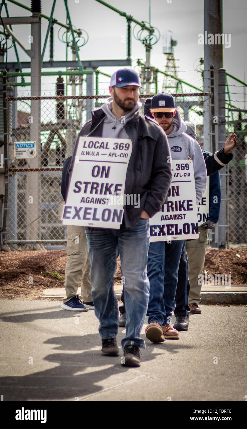 The workers in Boston walk the picket line during a worker's strike