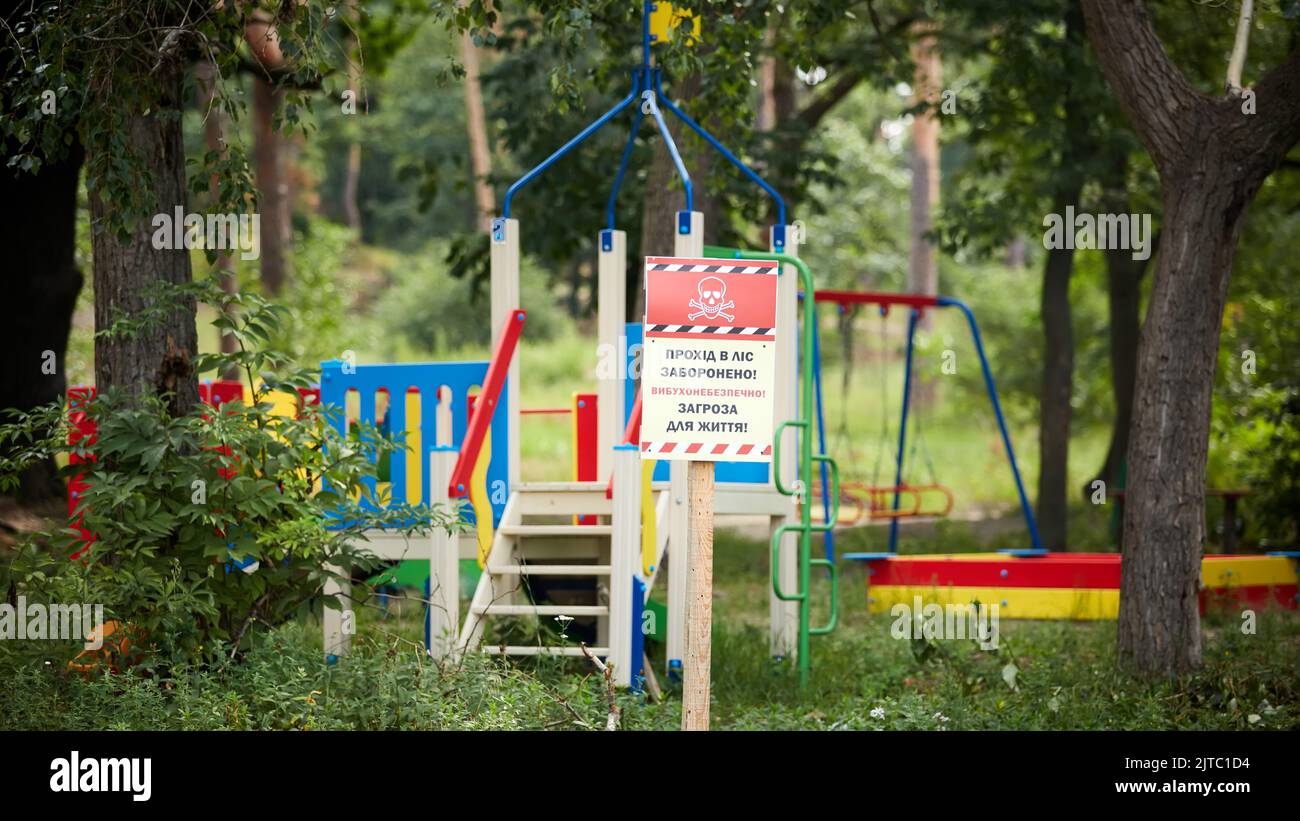 Playground And Sign Words On The Sign Beware Mines Stock Photo Alamy