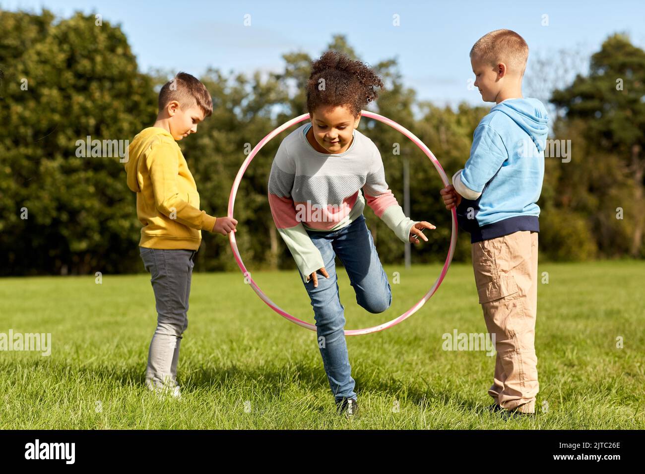 Its Hard Not To Be Happy When Youre Hula Hooping Stock Photo - Download  Image Now - Child, Plastic Hoop, Playful - iStock