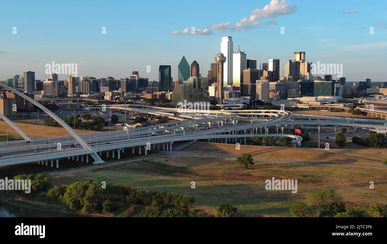 An aerial view of Dallas skyline with Margaret McDermott Bridge in ...