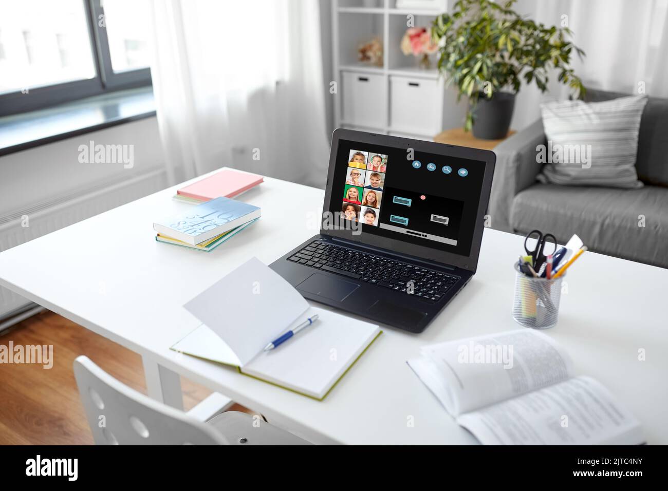 laptop's screen with students having online class Stock Photo - Alamy