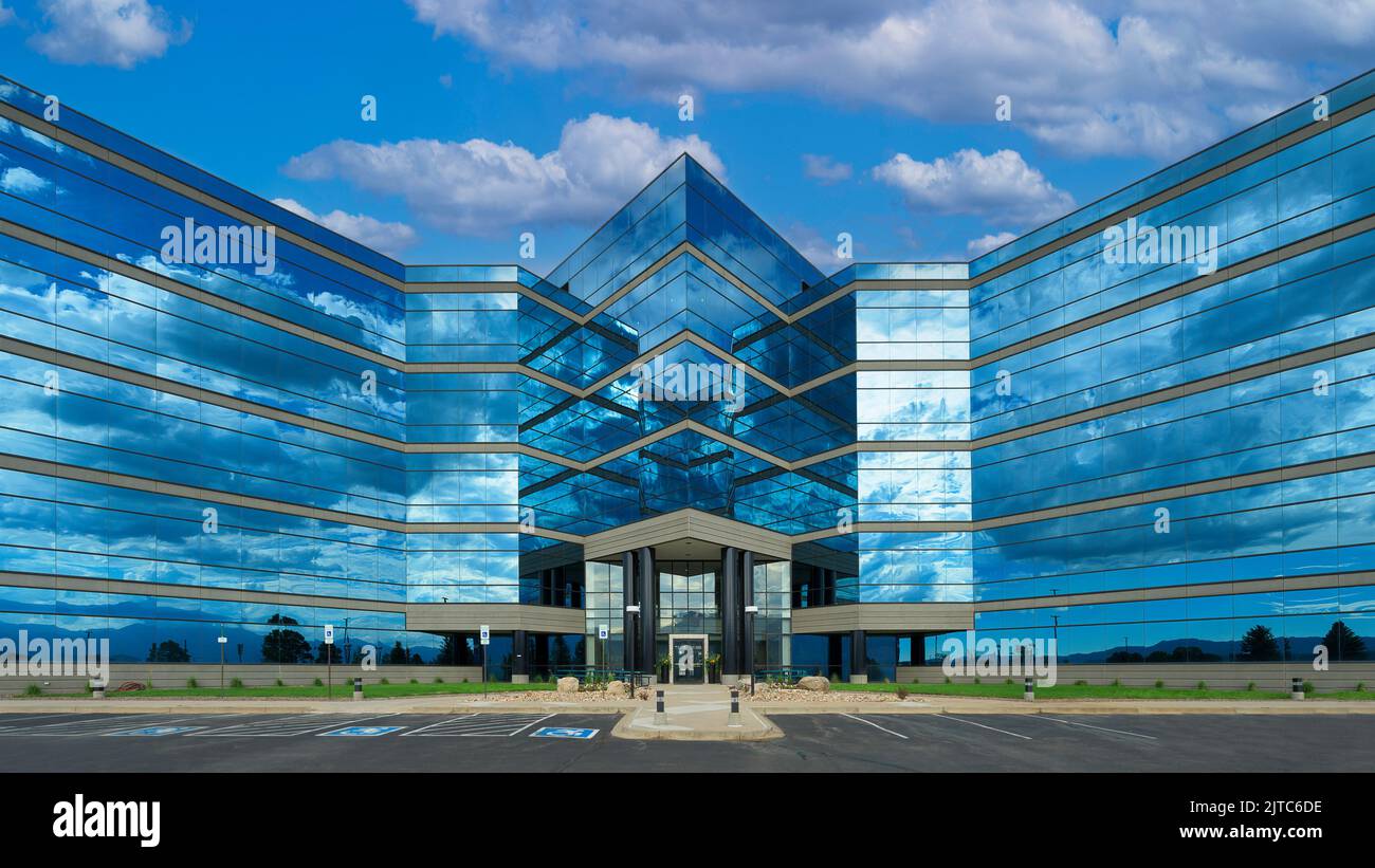 Modern glass blue reflective office building (Briargate Office Center