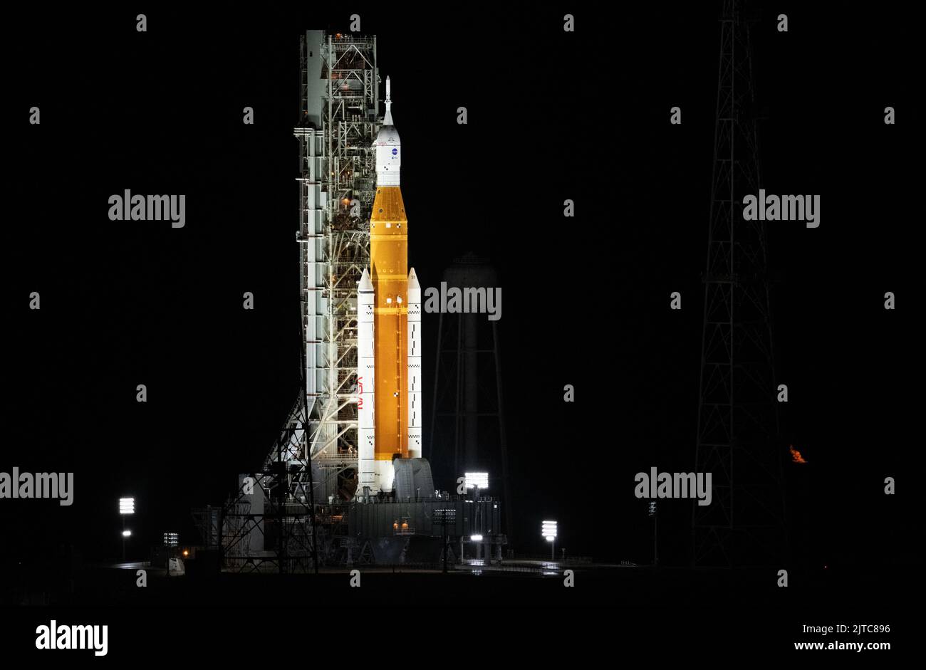 Kennedy Space Center, United States of America. 29 August, 2022. Dawn breaks over the NASA Space Launch System rocket with the Orion spacecraft during preflight on Launch Complex 39B at the Kennedy Space Center, August 29, 2022, in Cape Canaveral, Florida. The countdown for the un-crewed flight test was halted after a problem with the fuel system caused an extended delay. Credit: Joel Kowsky/NASA/Alamy Live News Stock Photo