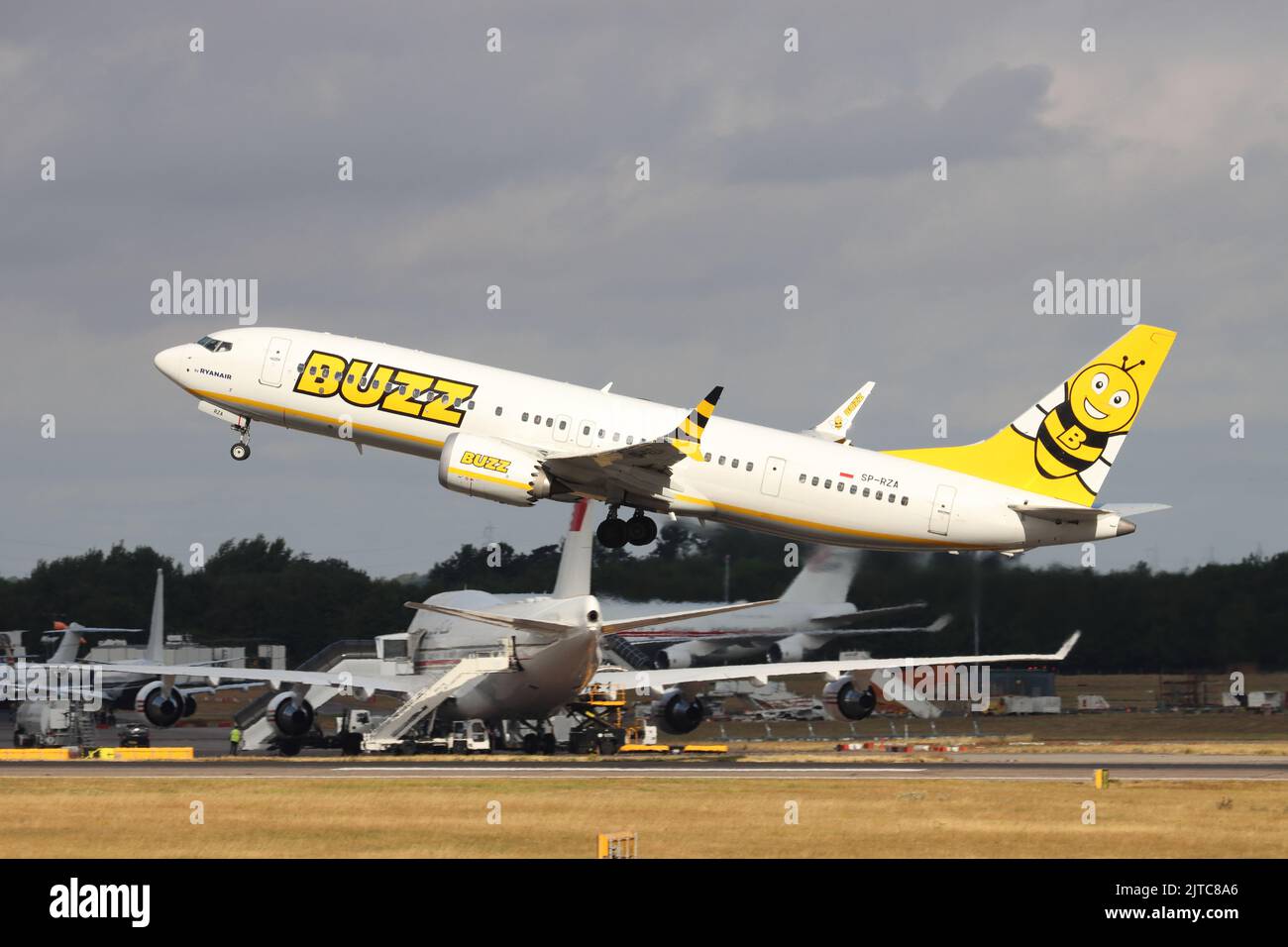 Buzz Air, Boeing 737 SP-RZE, departing London Stansted Airport, Essex, UK Stock Photo