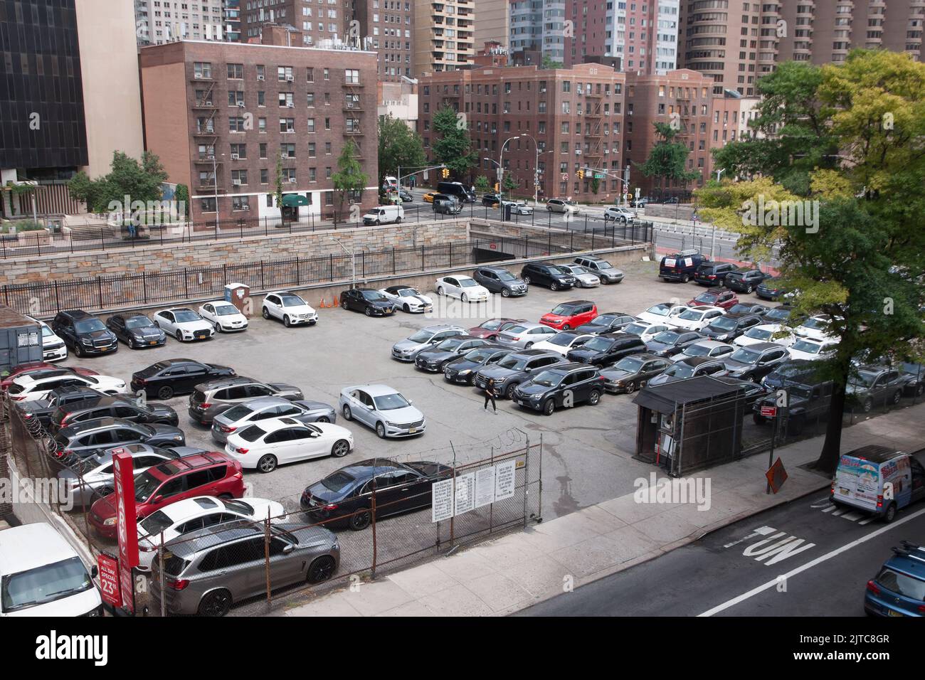 Outdoor car parking lot in midtown, Murray Hill, New York City, USA. Stock Photo