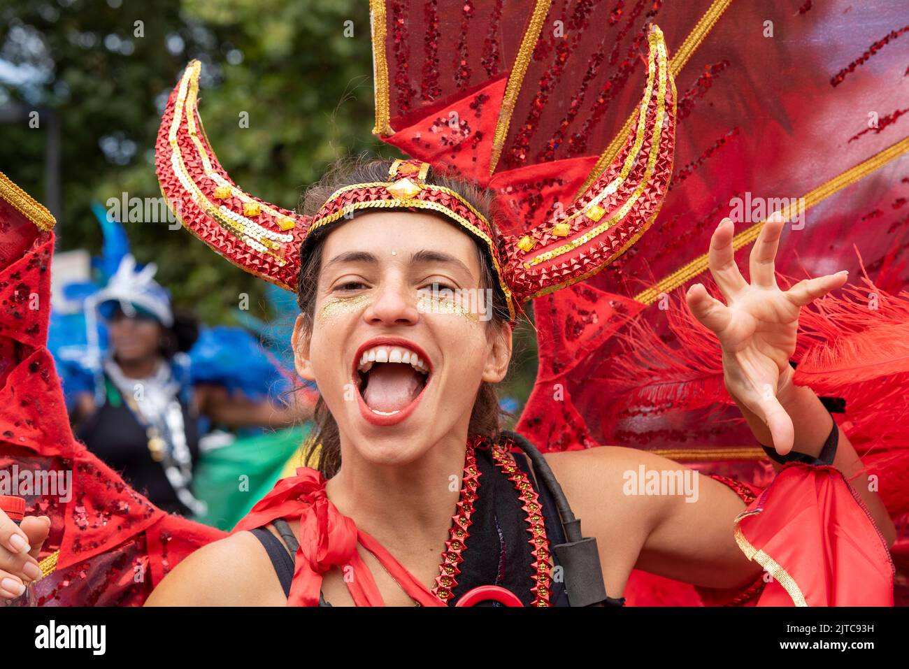 Female in elaborate costume with horns at the Notting Hill Carnival