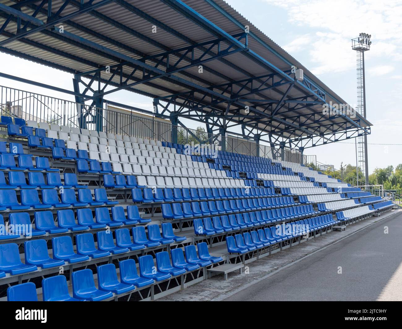 Armchairs seats blue chairs at the sport stadium Stock Photo Alamy
