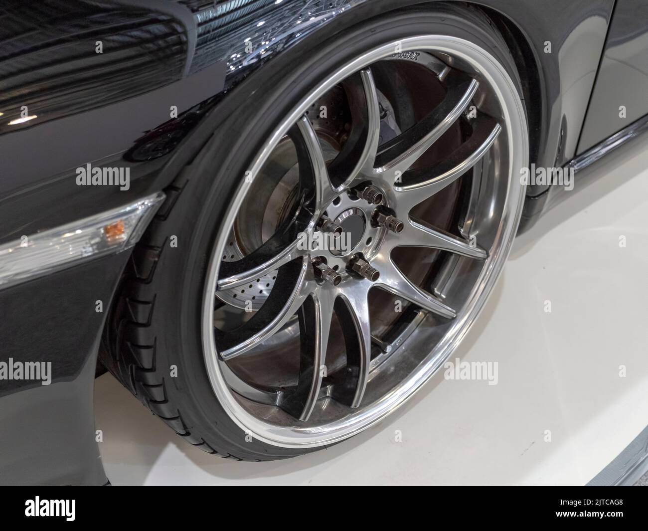 Close up view of a black low profile wheel with car rim Stock Photo - Alamy