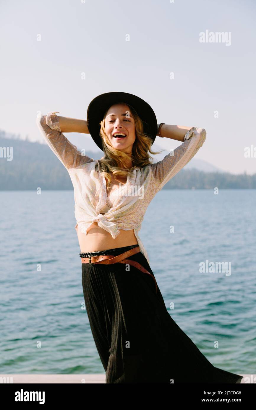 Woman posing on lake hi-res stock photography and images - Alamy