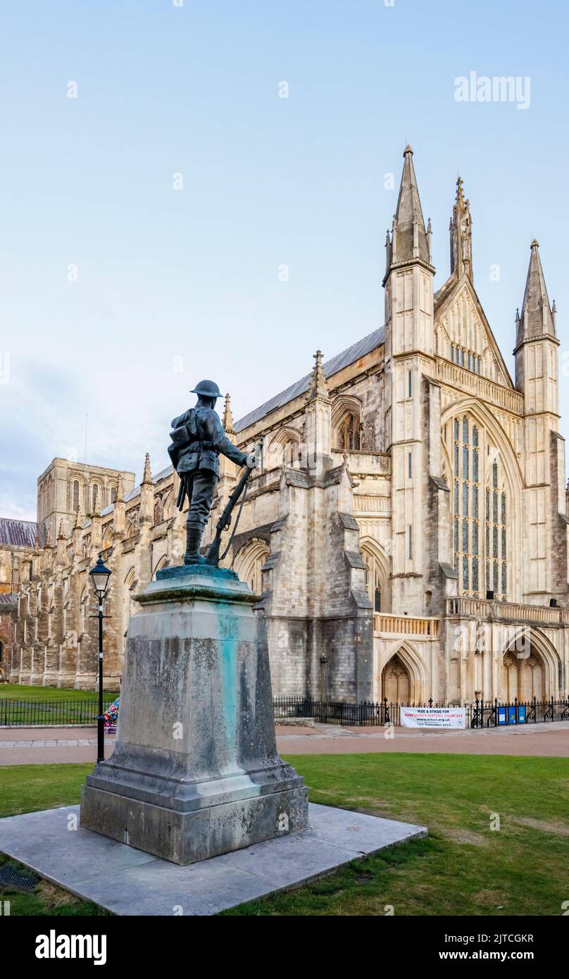 Winchester Cathedral, view of the West Front and  statue of a rifleman of The King's Royal Rifle Corps, Winchester, Hampshire, southern England Stock Photo