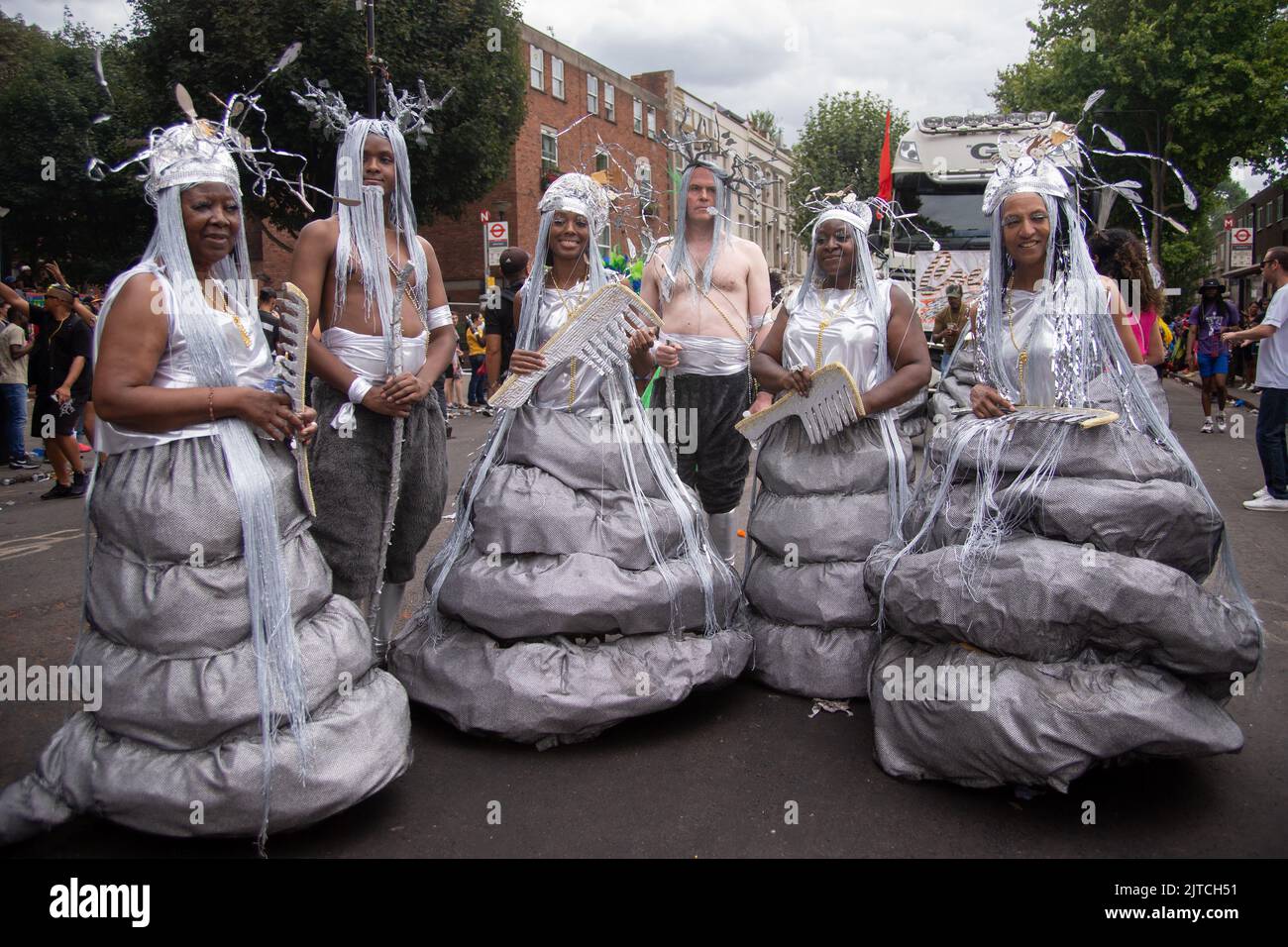 London, UK. 29th Aug, 2022. On Da Road with COCOYEA at Notting Hill Carnival 2022. Follow mas band COCOYEA through Notting Hill Carnival which is back after the years of COVID. Fantasy costumes and regional dress beguiled the eye and a man from Brazil rode a Tyrannosaurus Rex. Credit: Peter Hogan/Alamy Live News Stock Photo